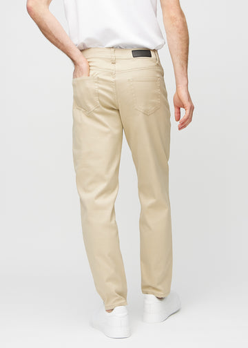Beige regular jeans set bagfra, så man kan se hele produktet.