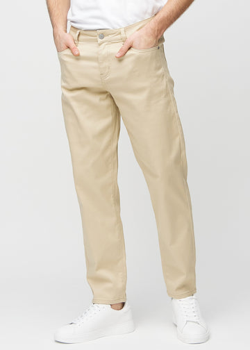 Beige regular jeans, modelnavn Gazelles, som går lige ned langs benet, set forfra.