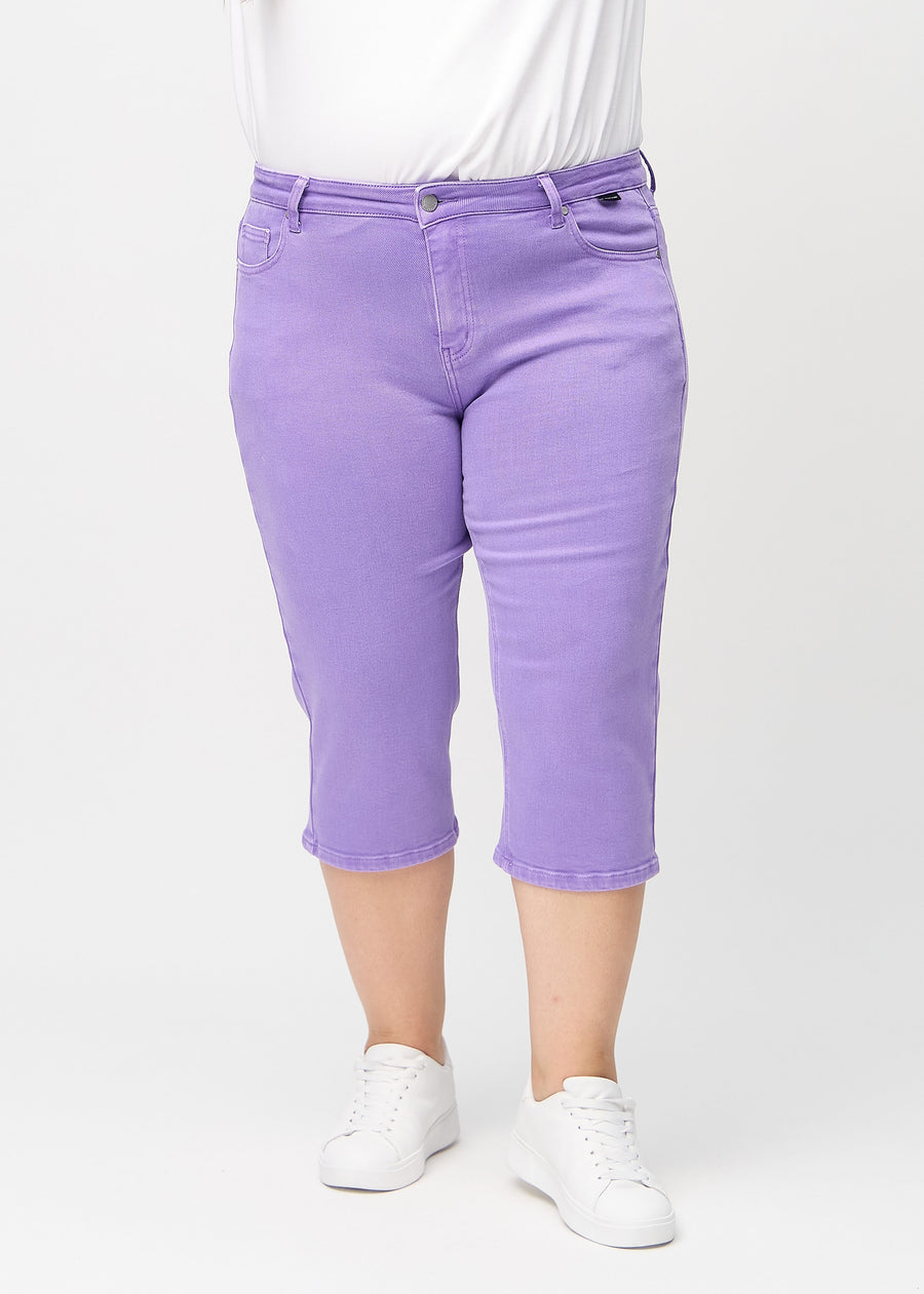 Purple regular capris, model name Lavenders, with a straight leg on a plus-size model, seen from the front.