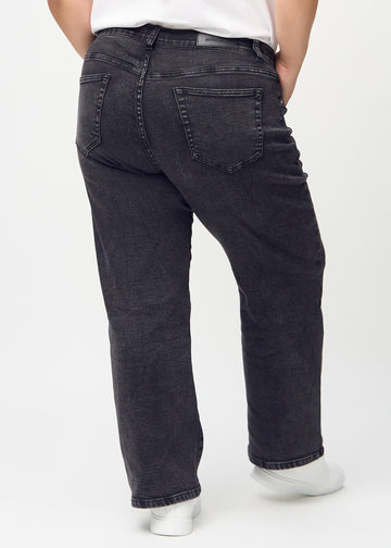 Loose jeans for women in dark grey, color Shadows. Back view on a plus-size model, showing the overall relaxed fit.