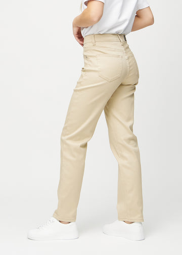 Beige Regular jeans in the color Gazelles, shown at an angle from the side on a model.