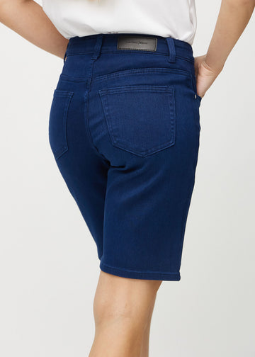 Dark blue regular middle shorts seen from the back close up to show details.