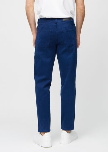 Dark blue regular jeans seen from the back, so the entire product can be seen.