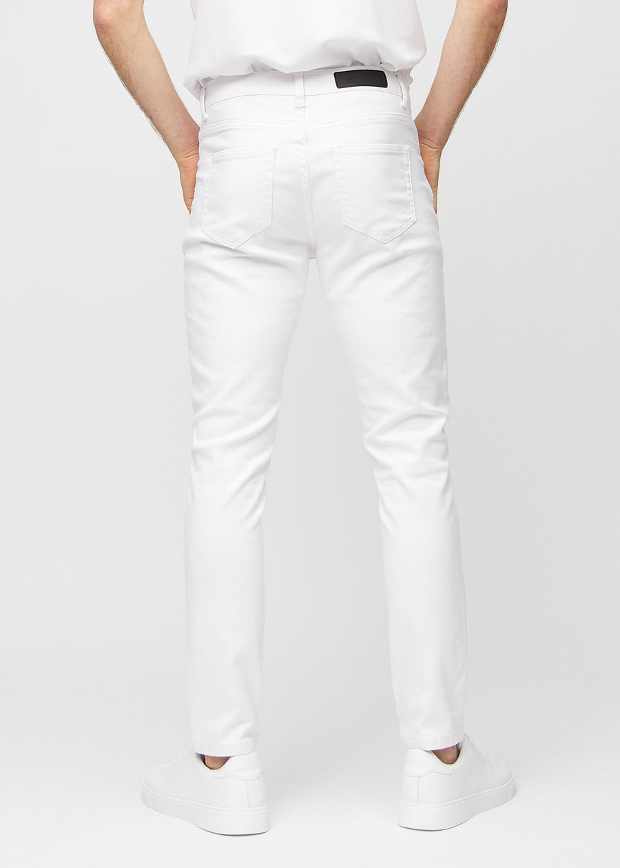 White slim jeans viewed from the back to show the full product.