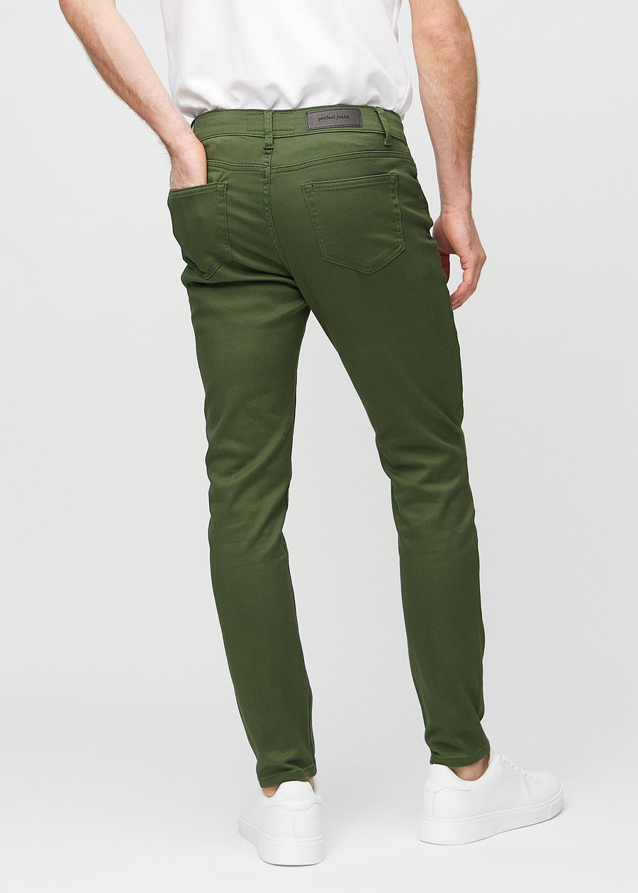 Dark green slim jeans viewed from the back to show the full product.