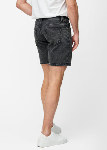 Dark grey denim shorts for men in the colour Shadows seen from the back, showing the length just above the knee.