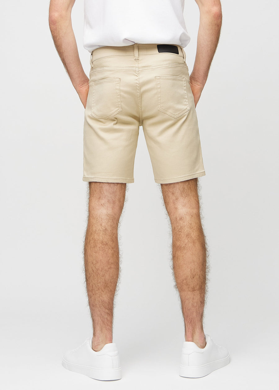 Beige middle-slim shorts seen from the back, so the entire product can be seen.