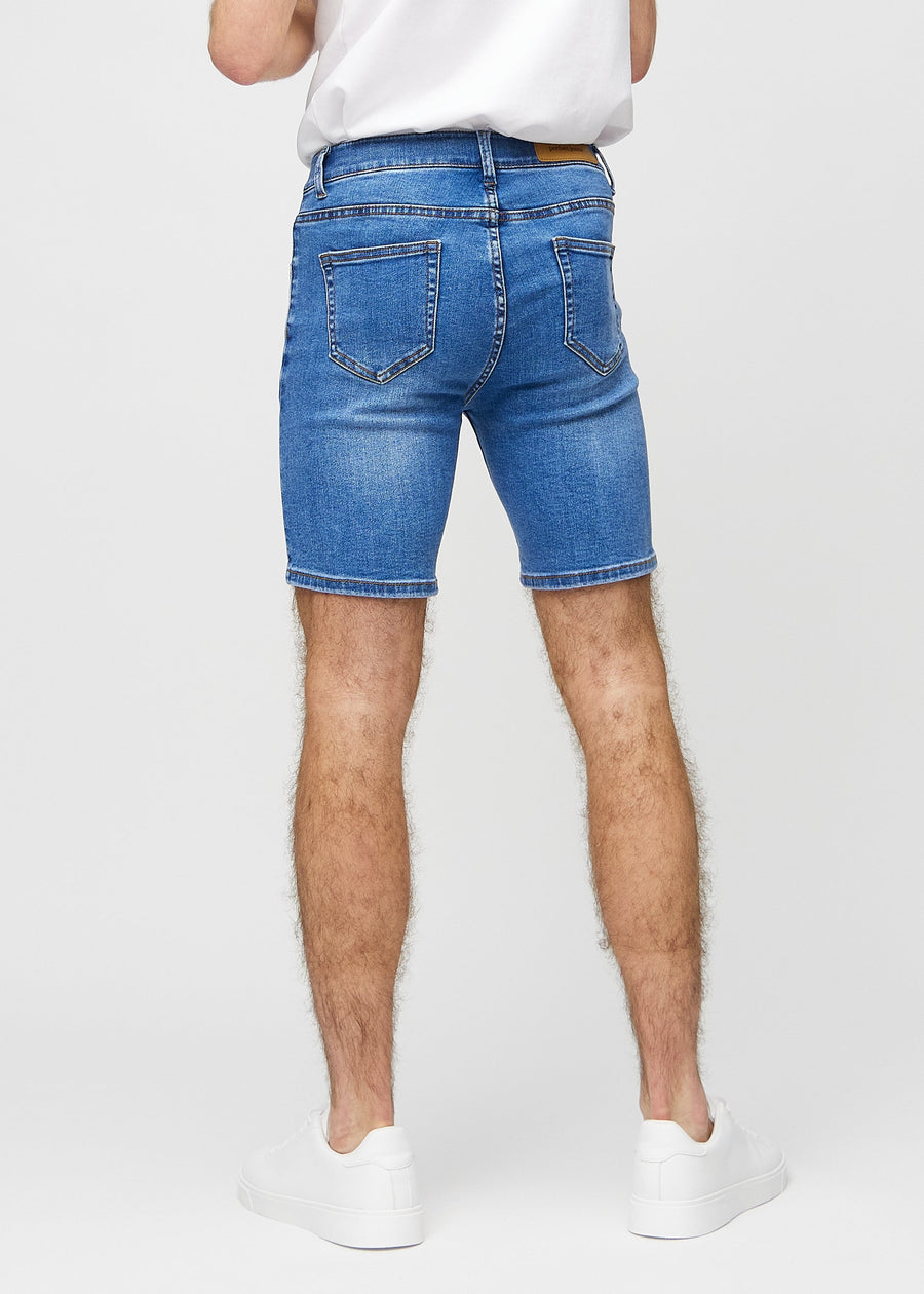 Denim middle-slim shorts seen from the back, so the entire product can be seen.